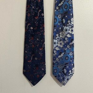 Used and authentic pair of blue Duchamp of London ties